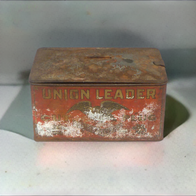 Vintage tin of Union Leader Cut Plug Tobacco, featuring classic branding and design